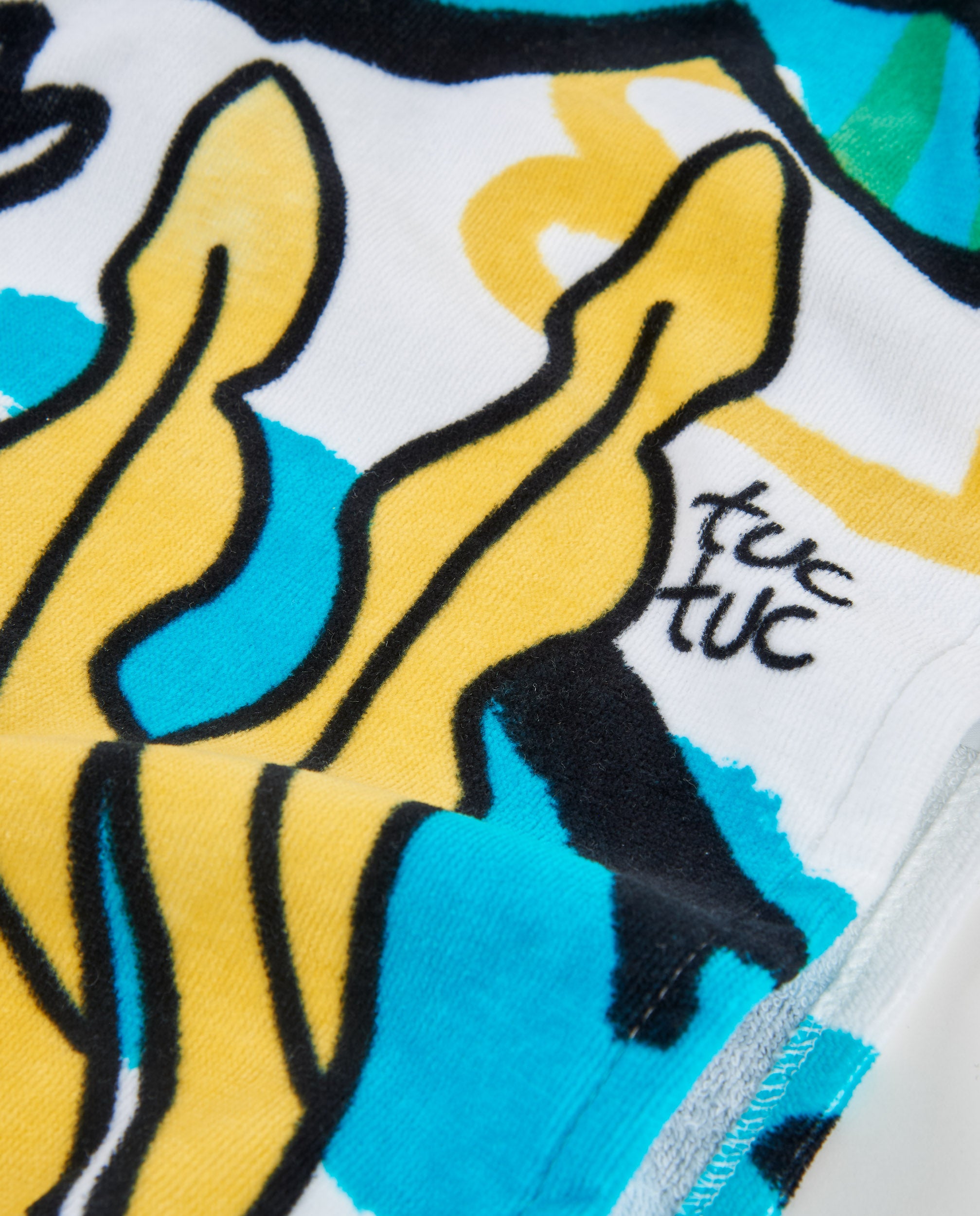 tuc-tuc-deniz-kizi-ponco-baski-detay-closeup