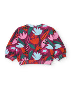 Crop sweatshirtin arkası; çiçek deseni sırtta da sürüyor, kol ve etek uçları çizgili ribana.