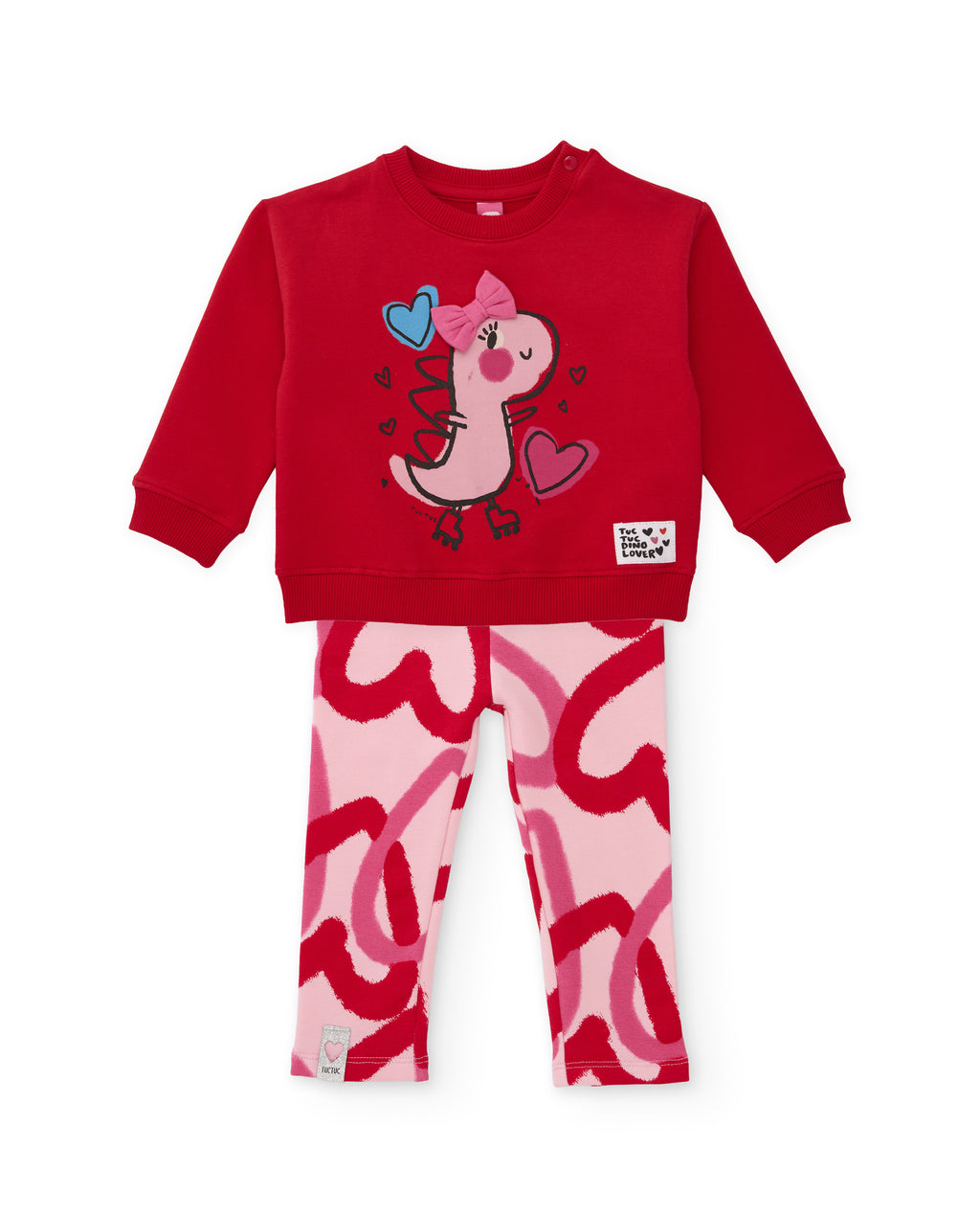 Tuc Tuc kırmızı sweatshirt ve pembe kalp desenli tayttan oluşan iki parça takım önden görünüyor.