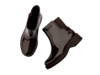 Melissa Chelsea Boot Dark Brown kadın bot – üstten görünüm, parlak yüzey ve elastik bilek detaylarıyla şık tasarım.