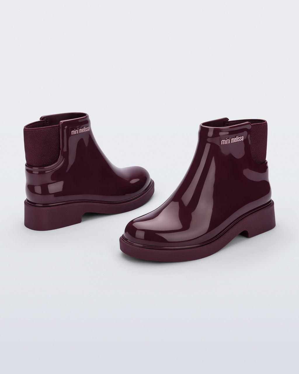 Bordo Mini Melissa Chelsea Boot II çocuk çifti üstten açıyla; örgü bilek manşeti net şekilde öne çıkıyor.