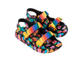 Mini Melissa Mix Inf siyah zeminli çok renkli neon desenli ve gökkuşağı bantlı çocuk sandalet çapraz görünüm