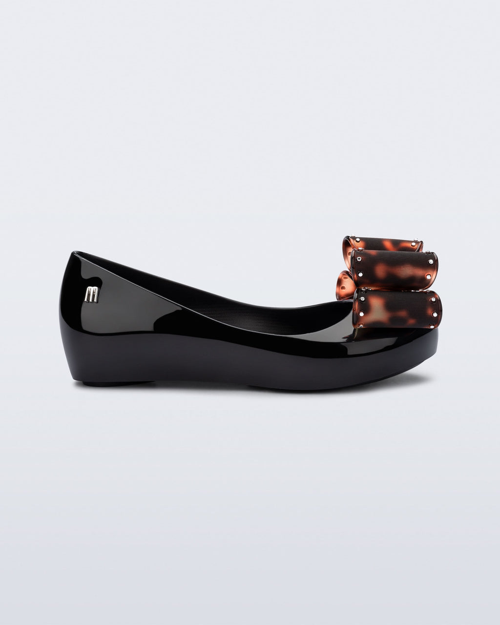 Mini Melissa Ultragirl Classic Bow Kids parlak siyah renkli tortoise fiyonk aplikeli kız çocuk babeti profilden görünüm