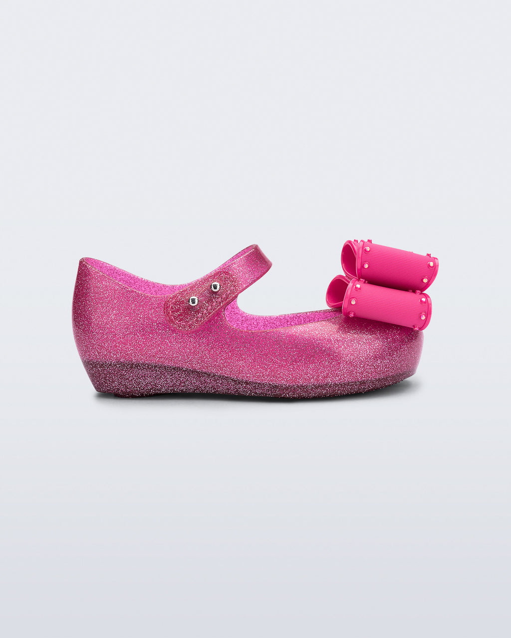 Mini Melissa Ultragirl Classic Bow simli pembe (glitter pink) fiyonklu kız çocuk babeti profilden görünüm