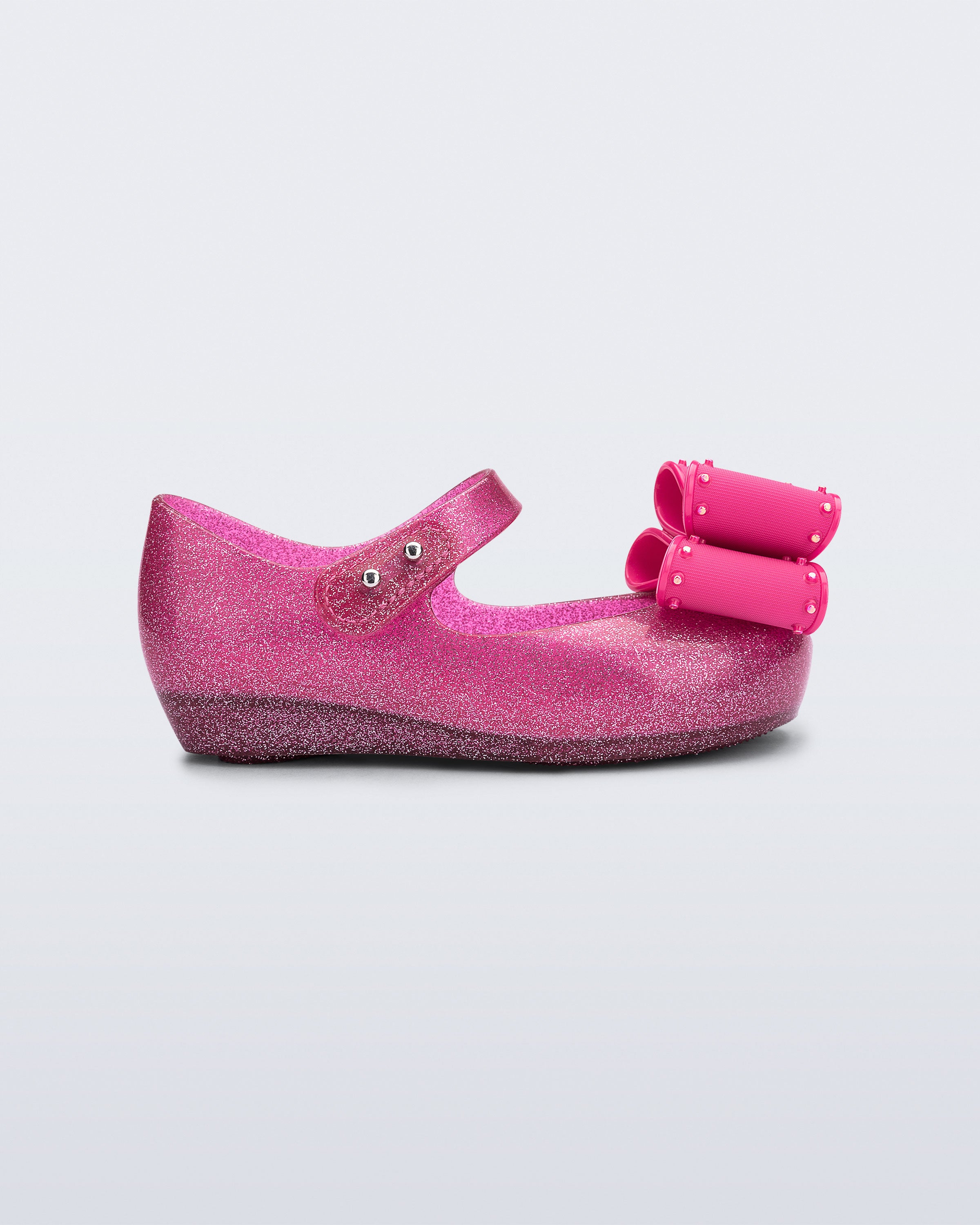 Mini Melissa Ultragirl Classic Bow simli pembe (glitter pink) fiyonklu kız çocuk babeti profilden görünüm