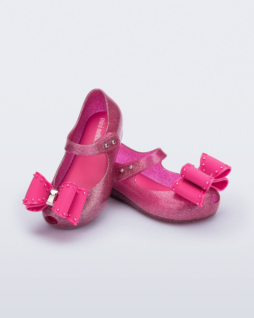 Vegan ve esnek Melflex dokulu Mini Melissa simli pembe kız bebek babet ayakkabısı ön açı