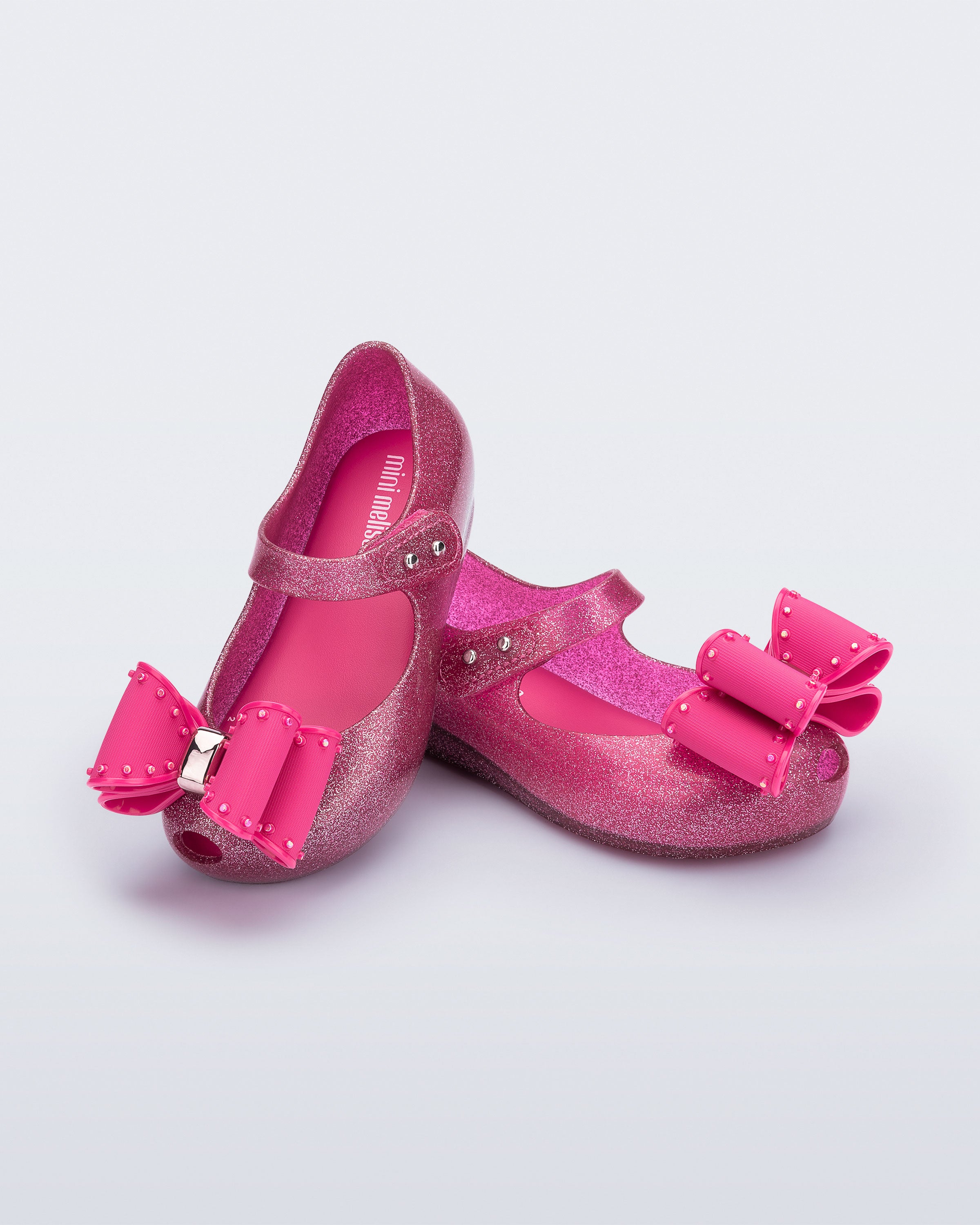 Vegan ve esnek Melflex dokulu Mini Melissa simli pembe kız bebek babet ayakkabısı ön açı