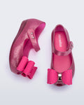 İkonik kokulu Mini Melissa pembe fiyonklu çocuk ayakkabısı yumuşak iç taban ve cırt cırt detaylı üstten görünüm