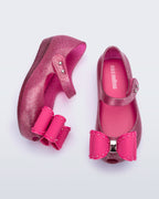 İkonik kokulu Mini Melissa pembe fiyonklu çocuk ayakkabısı yumuşak iç taban ve cırt cırt detaylı üstten görünüm