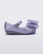 Mini Melissa Ultragirl Classic Bow simli lila fiyonklu kız çocuk babeti önden yan görünüm esnek Melflex vegan materyal