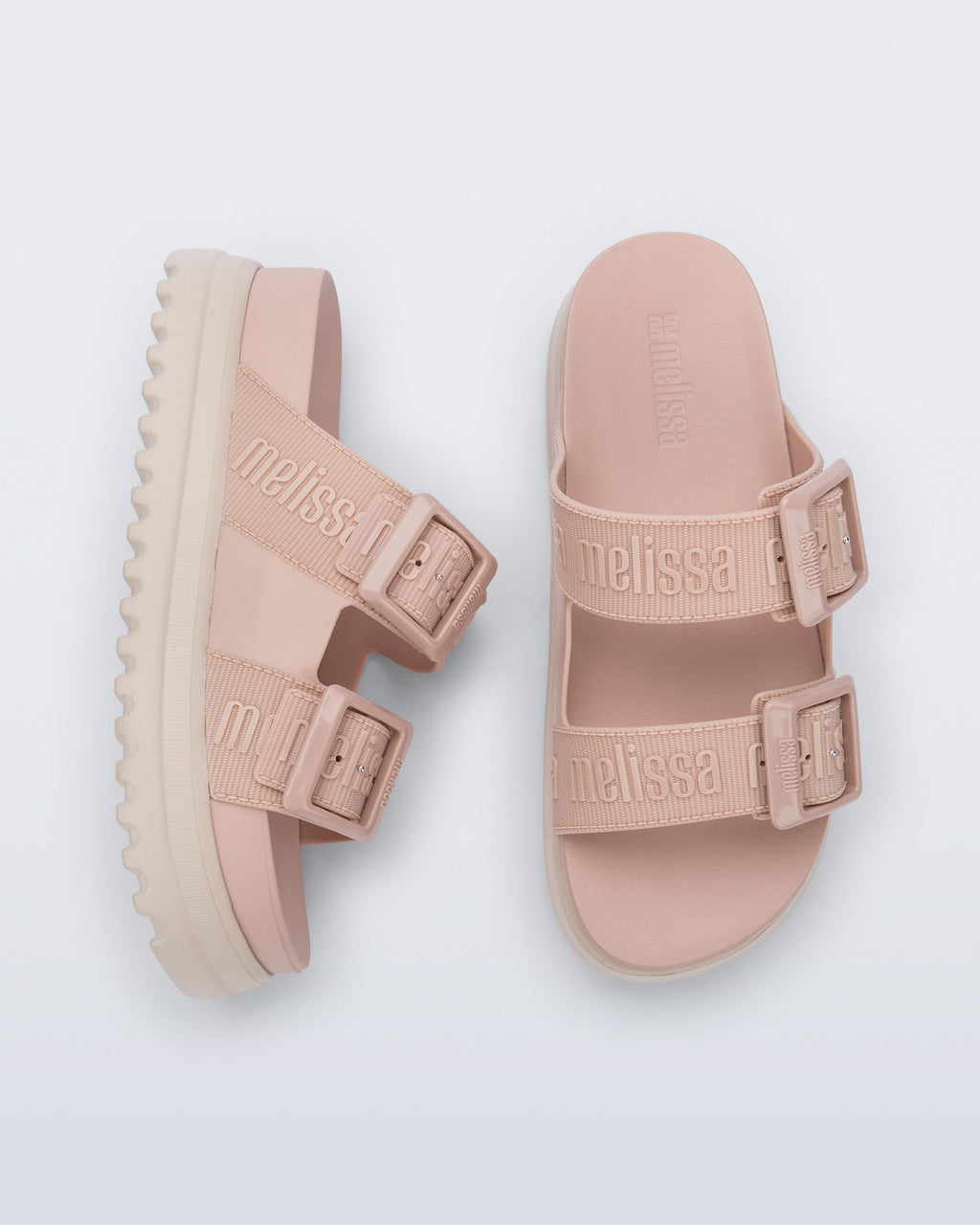 Logolu geniş bantları ve dokulu EVA iç tabanıyla Melissa Cozy M-Lover pudra pembe kadın platform terlik üstten görünüm