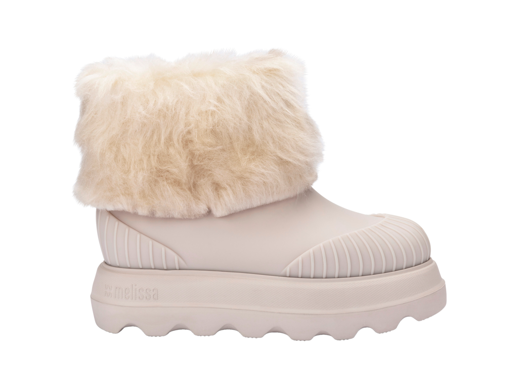 Melissa Warm Boot bej kadın bot – sağ profil görünüm, EVA taban ve kavisli hatlarıyla modern ve rahat kışlık stil.