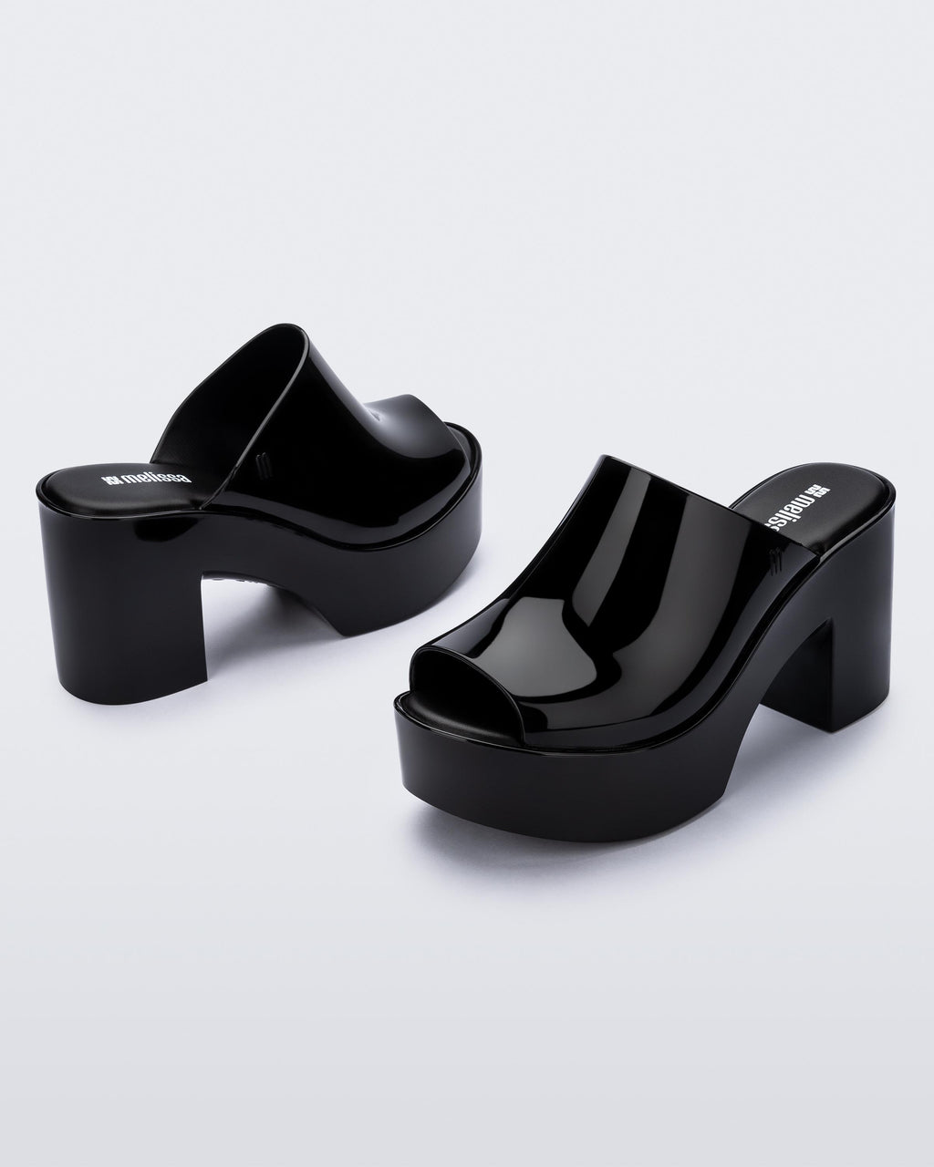 “Melissa Mule Hype siyah jelly kadın topuklu terlik – üst görünüm modern kubbe kalıp detaylarıyla”