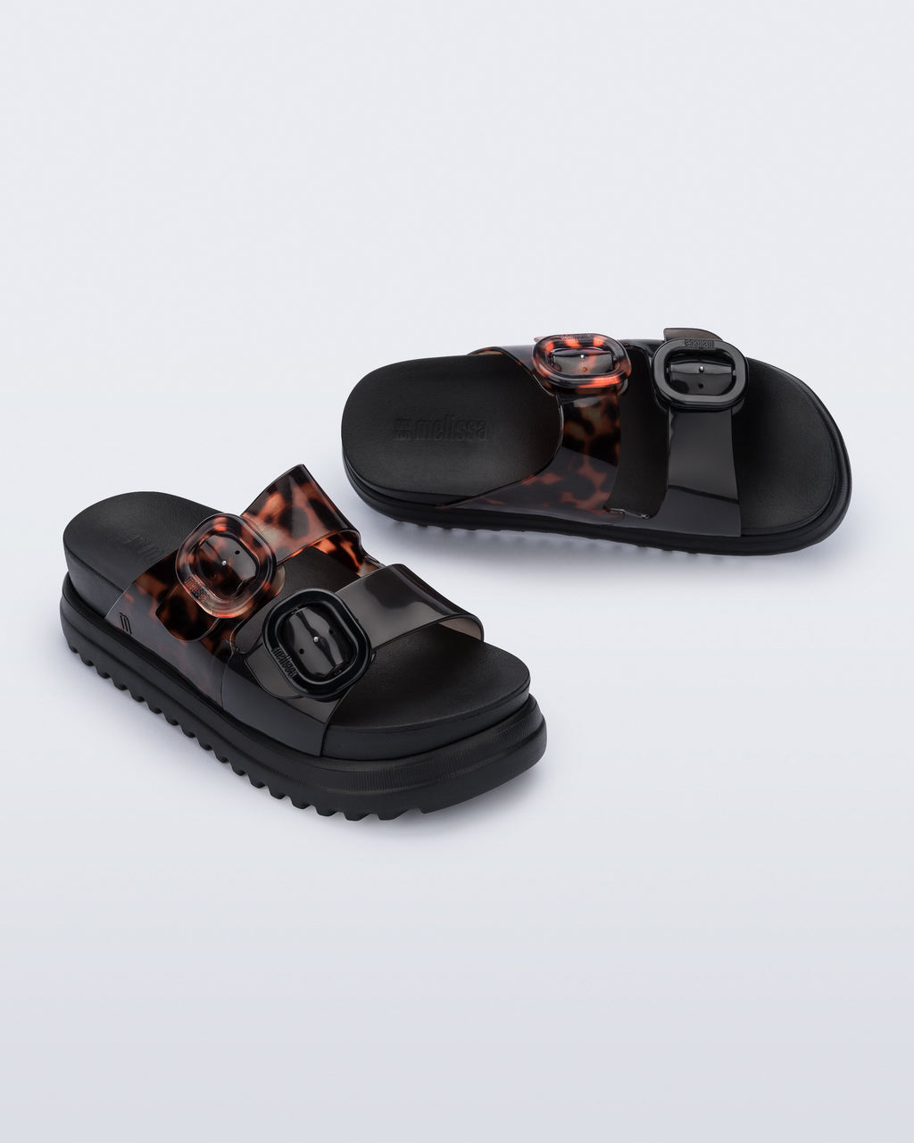 Melissa Cozy Platform Black/Tortoise kadın terlik çiftli ürün görseli – siyah platform taban yapısı