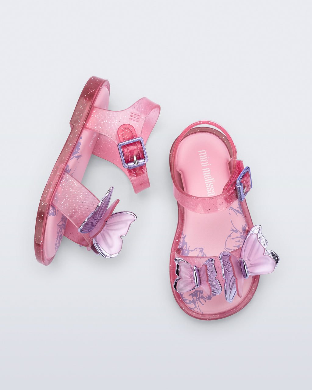 Mini Melissa Fly Sandal III Baby simli pembe üstten görünüm, çift kelebek aplike detayı
