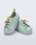 Mint yeşili Mini Melissa Bloomy Sneaker çifti üstten açıyla; çiçek desenli taban net şekilde görünüyor.