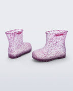 Şeffaf lila Mini Melissa Welly Shiny çifti üstten açıyla; simli kalp parçacıkları net görünüyor.
