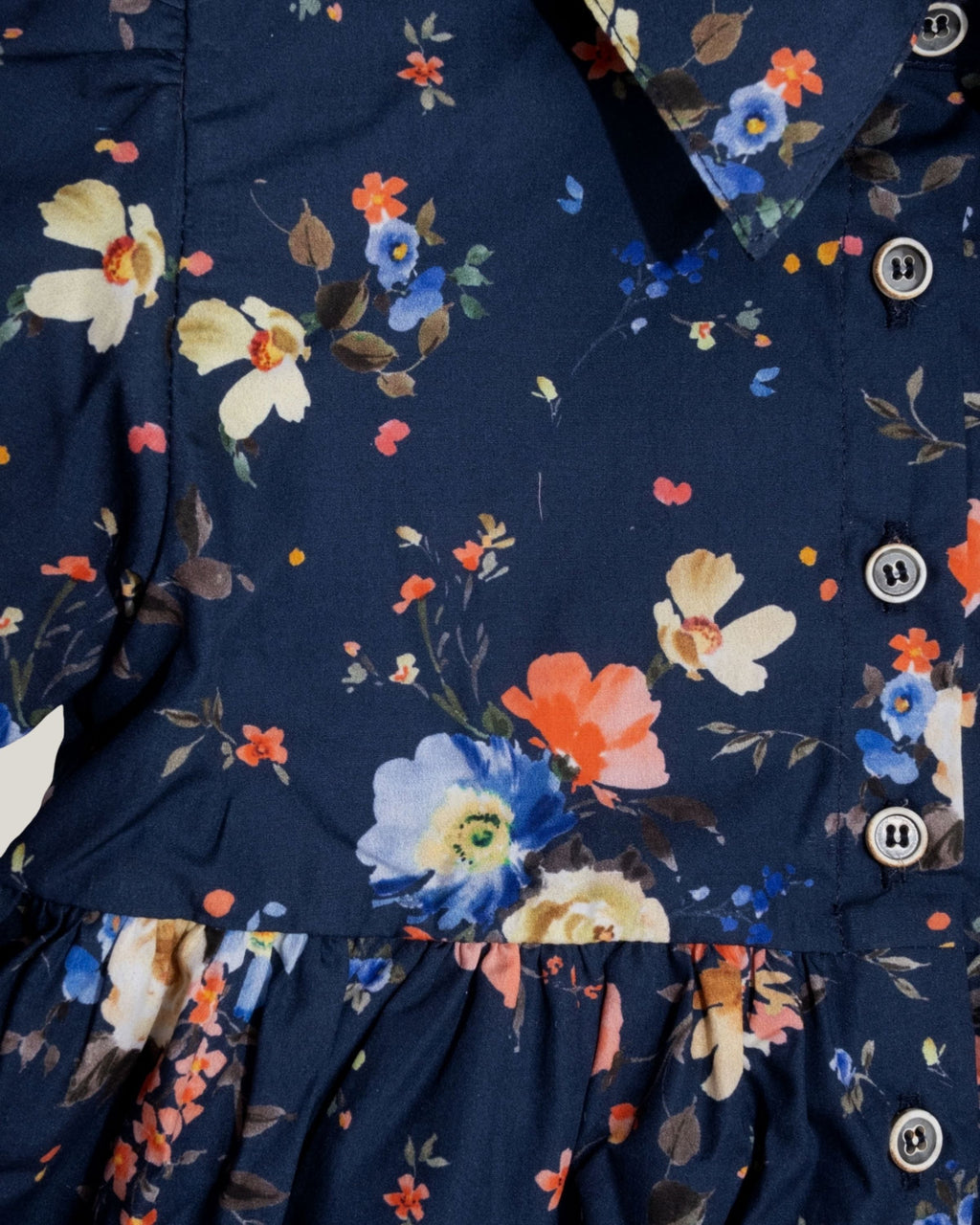 Ozmoz çiçek desenli lacivert kız çocuk elbise yakın görünüm stüdyo 5-12 yaş
