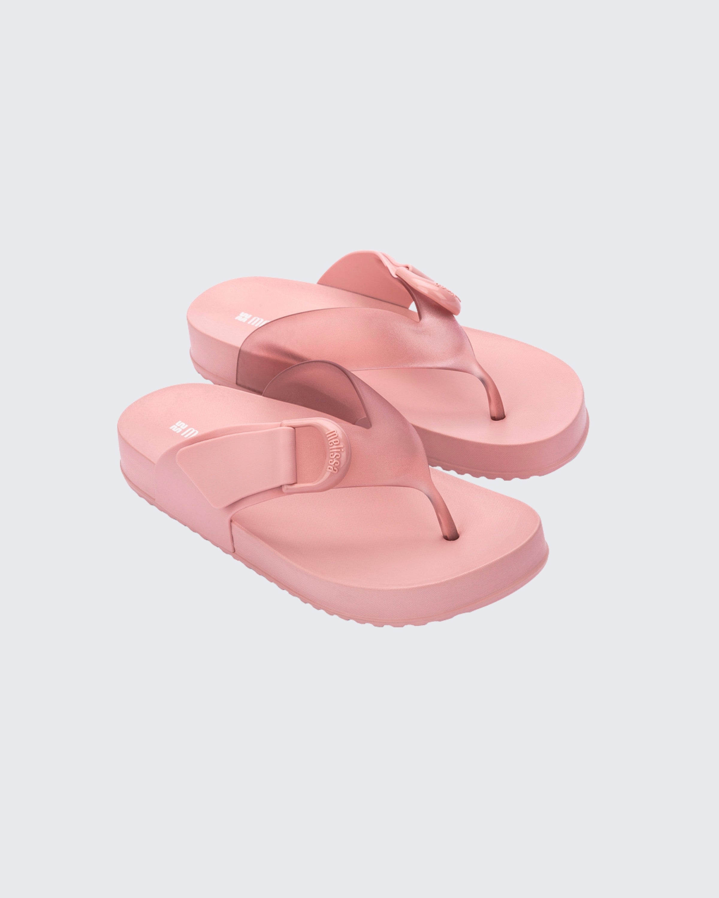 Farklı Melflex dokularını harmanlayan Melissa Cozy Thong pembe parmak arası terlik çapraz görünüm