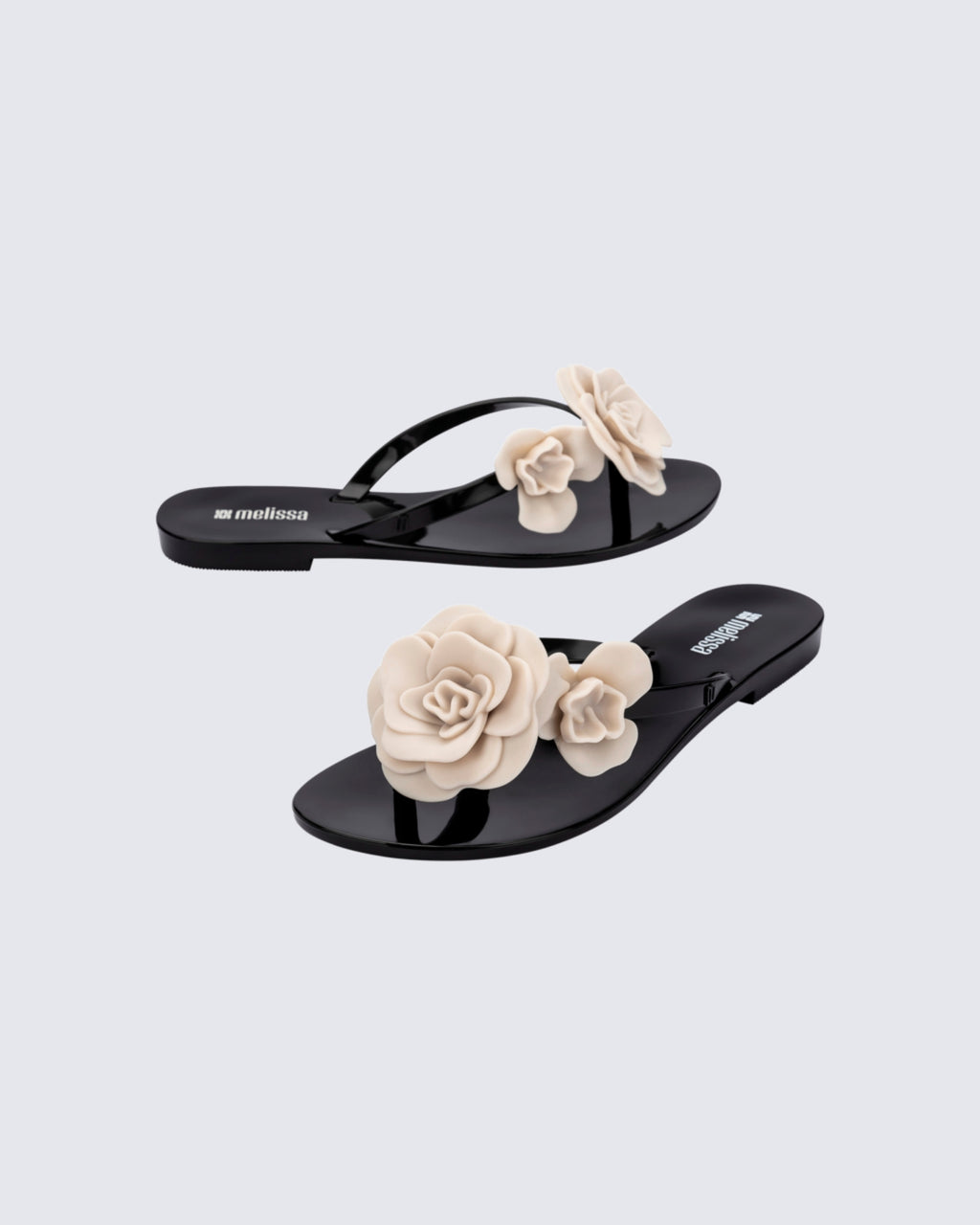 “Melissa Harmonic Petals siyah flip-flop – modern şık yaz terliği”