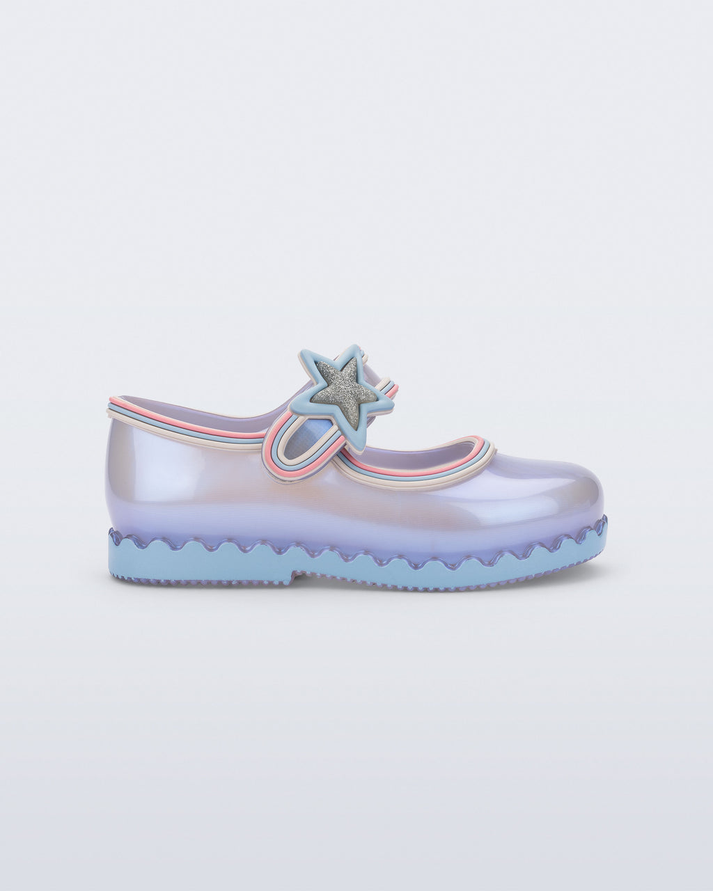 Mini Melissa Hip Ballerina Star sedefli mavi babet yandan; pastel çizgili biye ve mavi dalgalı taban.
