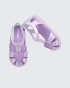 Mini Melissa Hip Heart lila sandalet üstten görünüm, 3D kalp aplike detay ve yazlık açık yapı