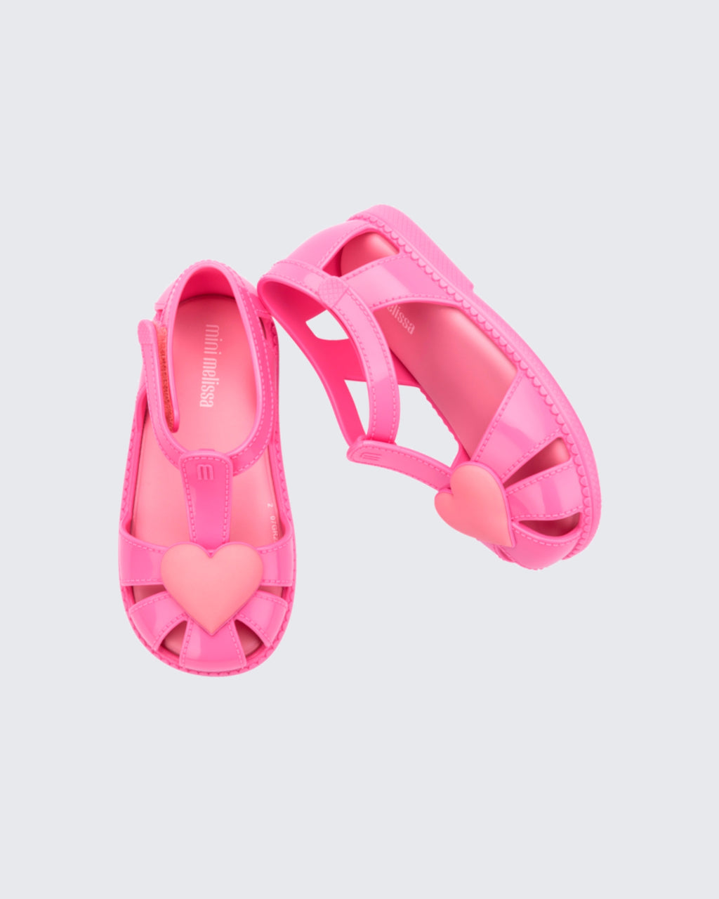 Mini Melissa Hip Heart pembe kalpli çocuk sandalet üstten görünüm, açık yapı ve cırt cırtlı kayış detayı