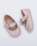 Mini Melissa pudra pembe bebek babeti üstten görünüm, peluş kaplı yumuşak iç taban