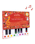 The Story Orchestra I Can Play The Nutcracker kitabının kırmızı kapağı ve renkli notalı piyano tuşları
